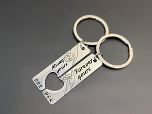 Matching engraved couple keychains in rose gold, featuring minimalist hand design and heartfelt love messages
