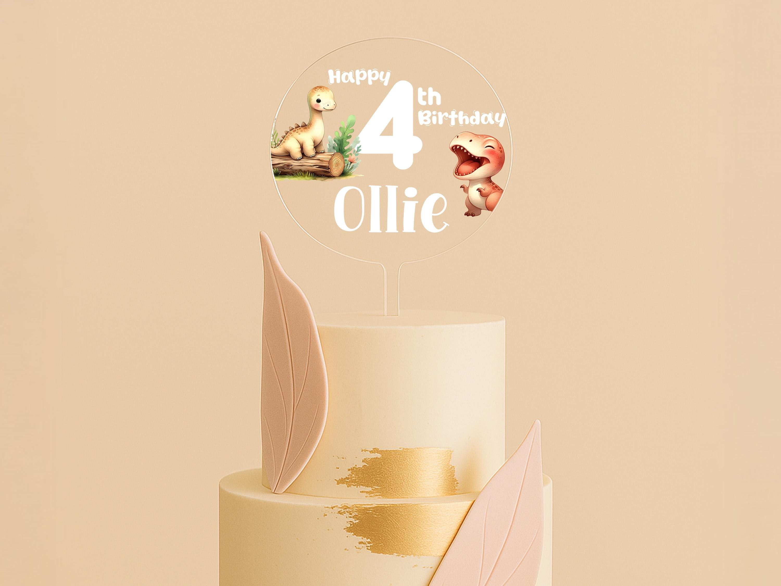 a three tiered cake with a happy birthday topper