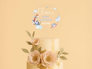 a three tiered cake with flowers on top