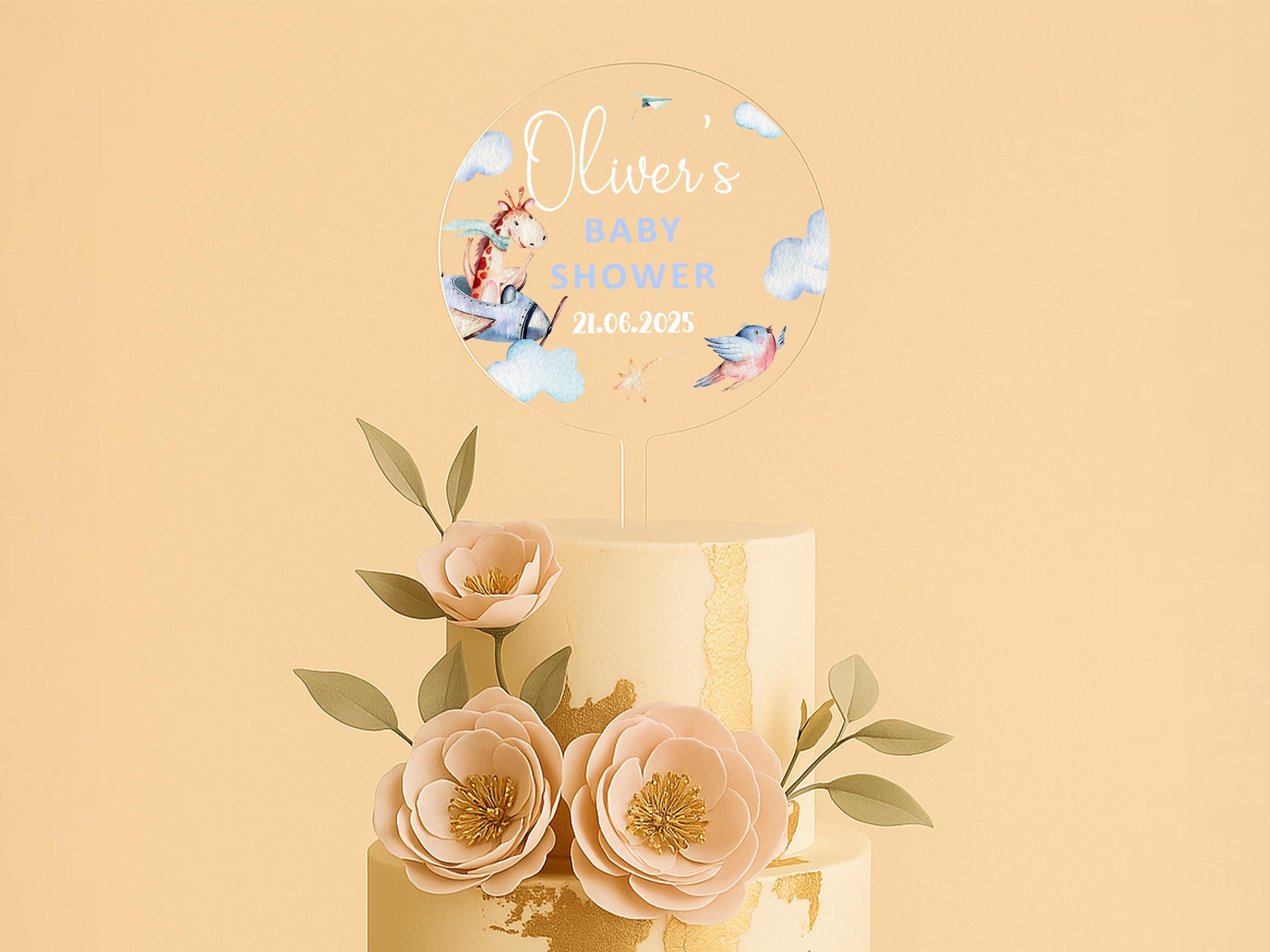 a three tiered cake with flowers on top
