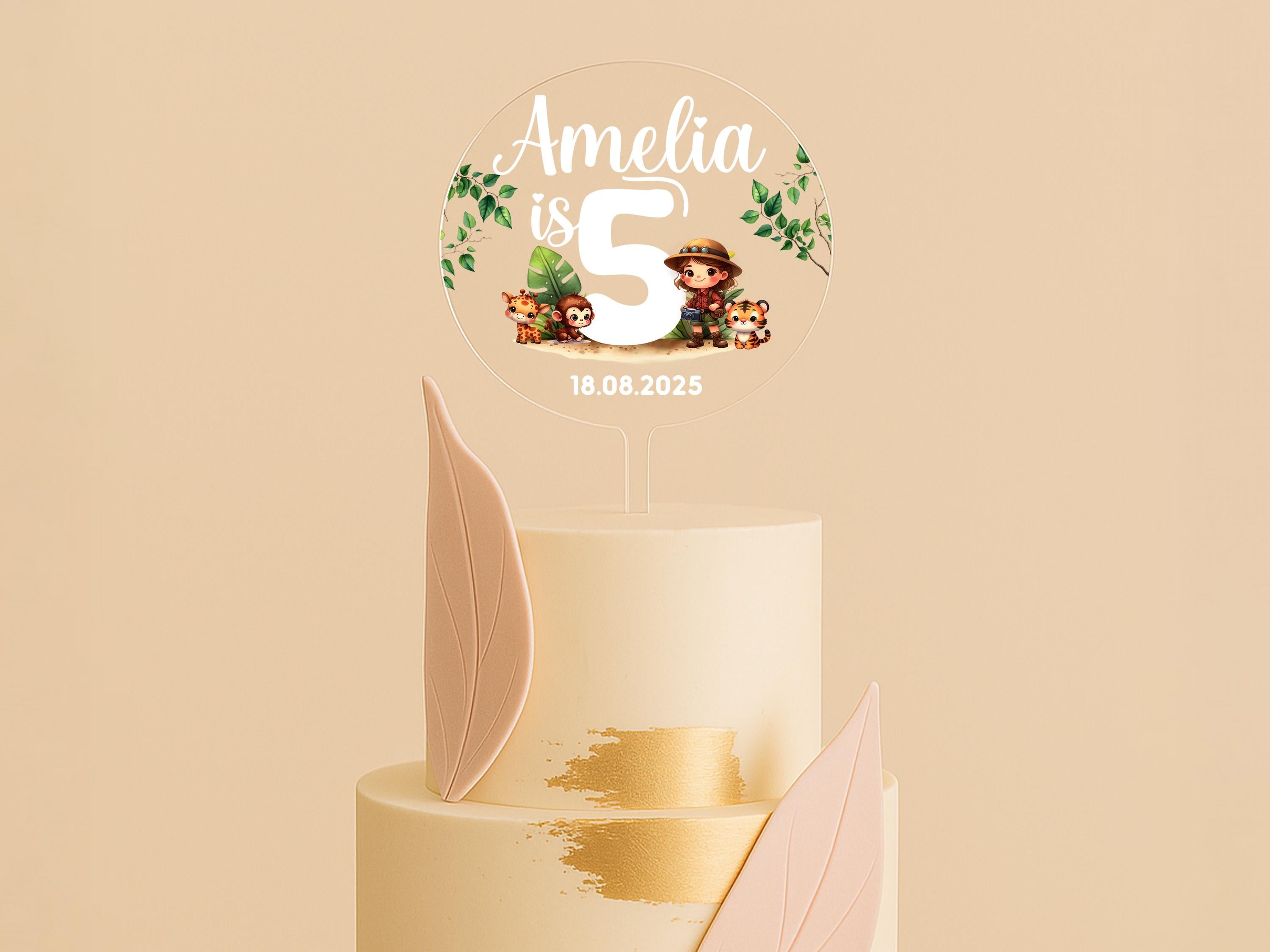 a wedding cake with a topper on it