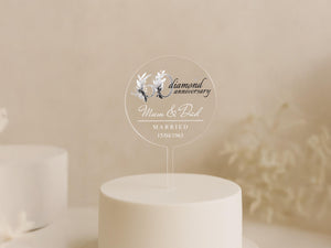 a wedding cake with a white frosted cake topper