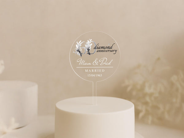 a wedding cake with a white frosted cake topper