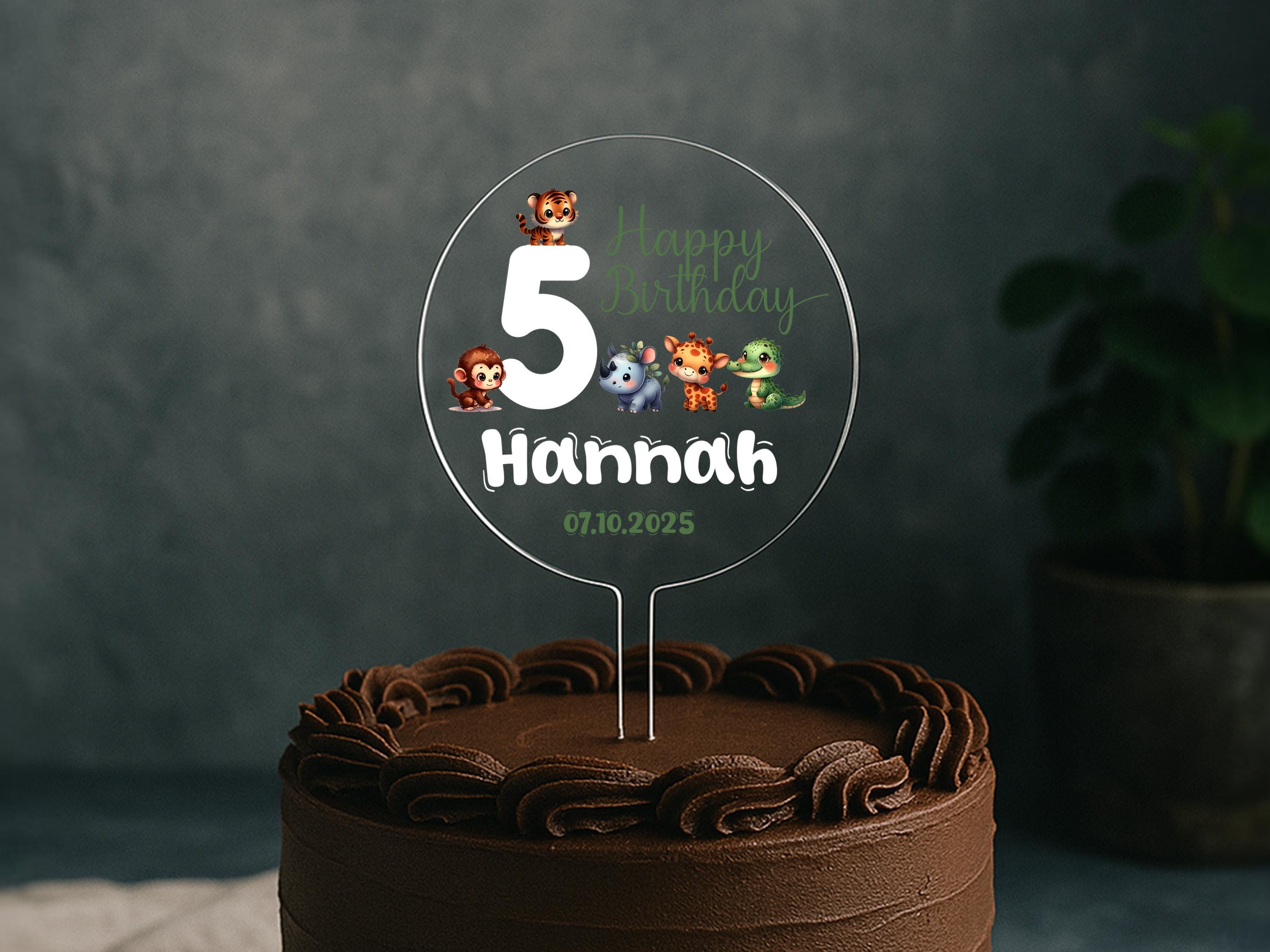 a birthday cake with the number five on it