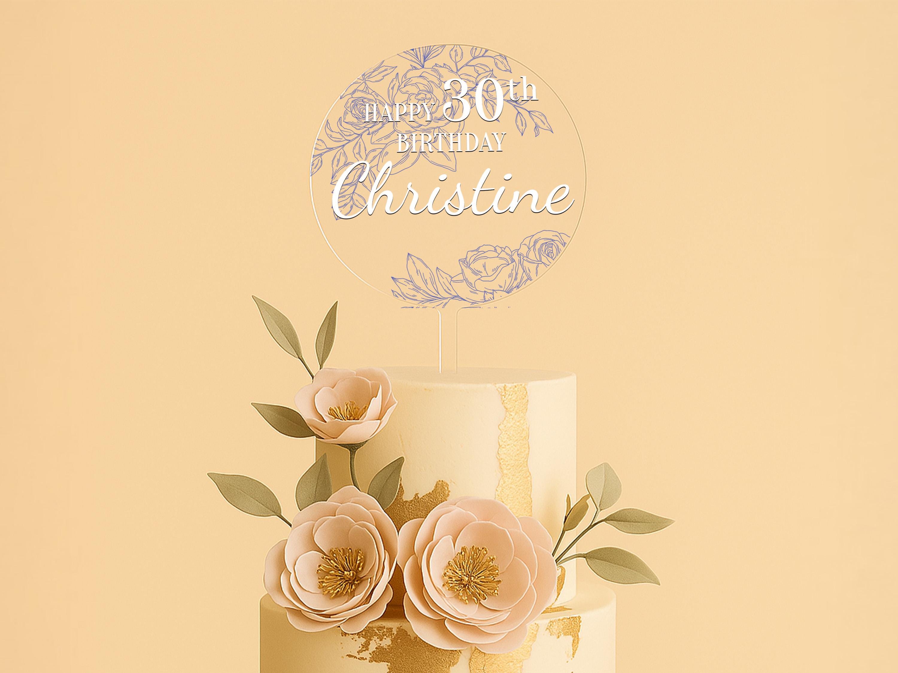 a wedding cake with flowers on top of it