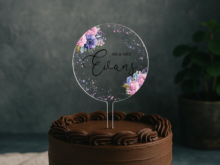 a chocolate cake with a cake topper that says, we are married