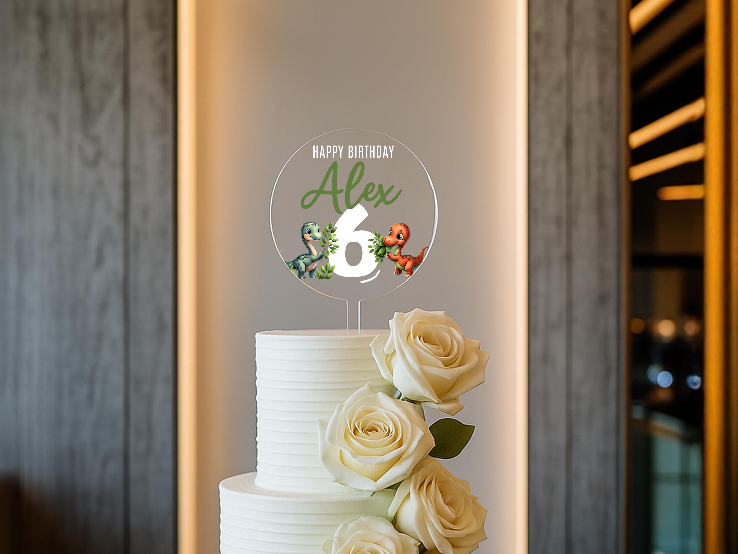 a white cake with flowers on top of it
