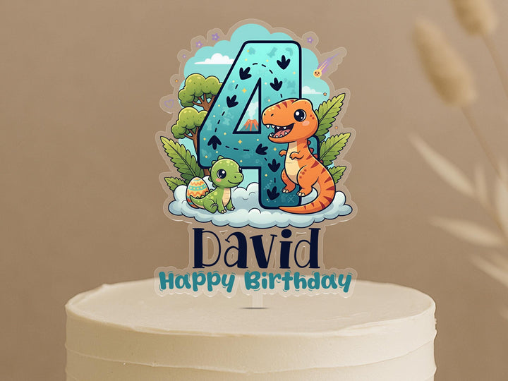 A birthday cake topper featuring a dinosaur and a number 4, with the text &quot;David Happy Birthday&quot; below.
