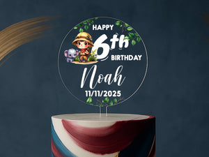a birthday cake with a cartoon character on top