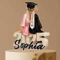 Graduation Cake Topper – Custom Name Female Graduate Sitting on Class of 2025