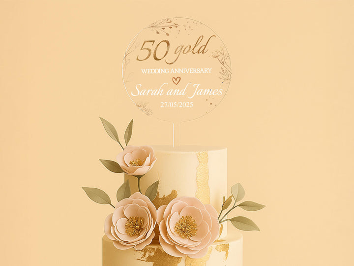 a wedding cake with flowers on top of it