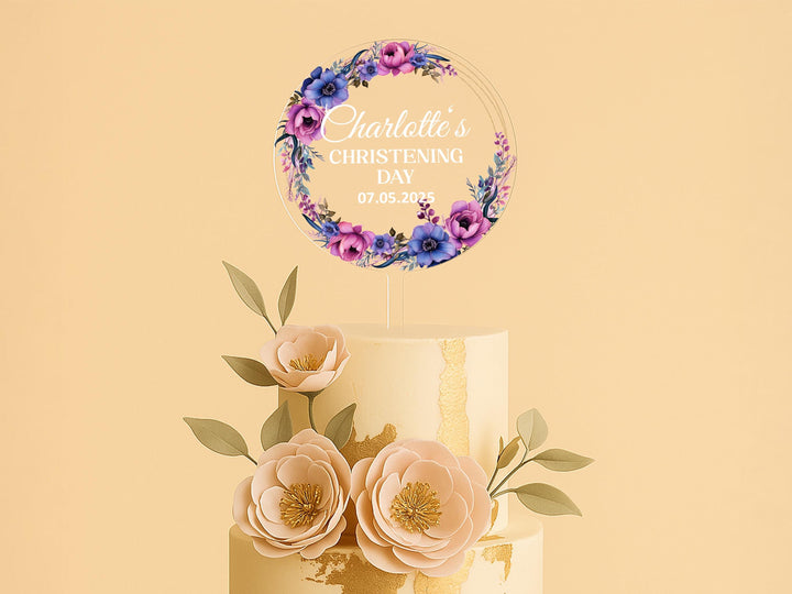 a wedding cake with flowers on top of it