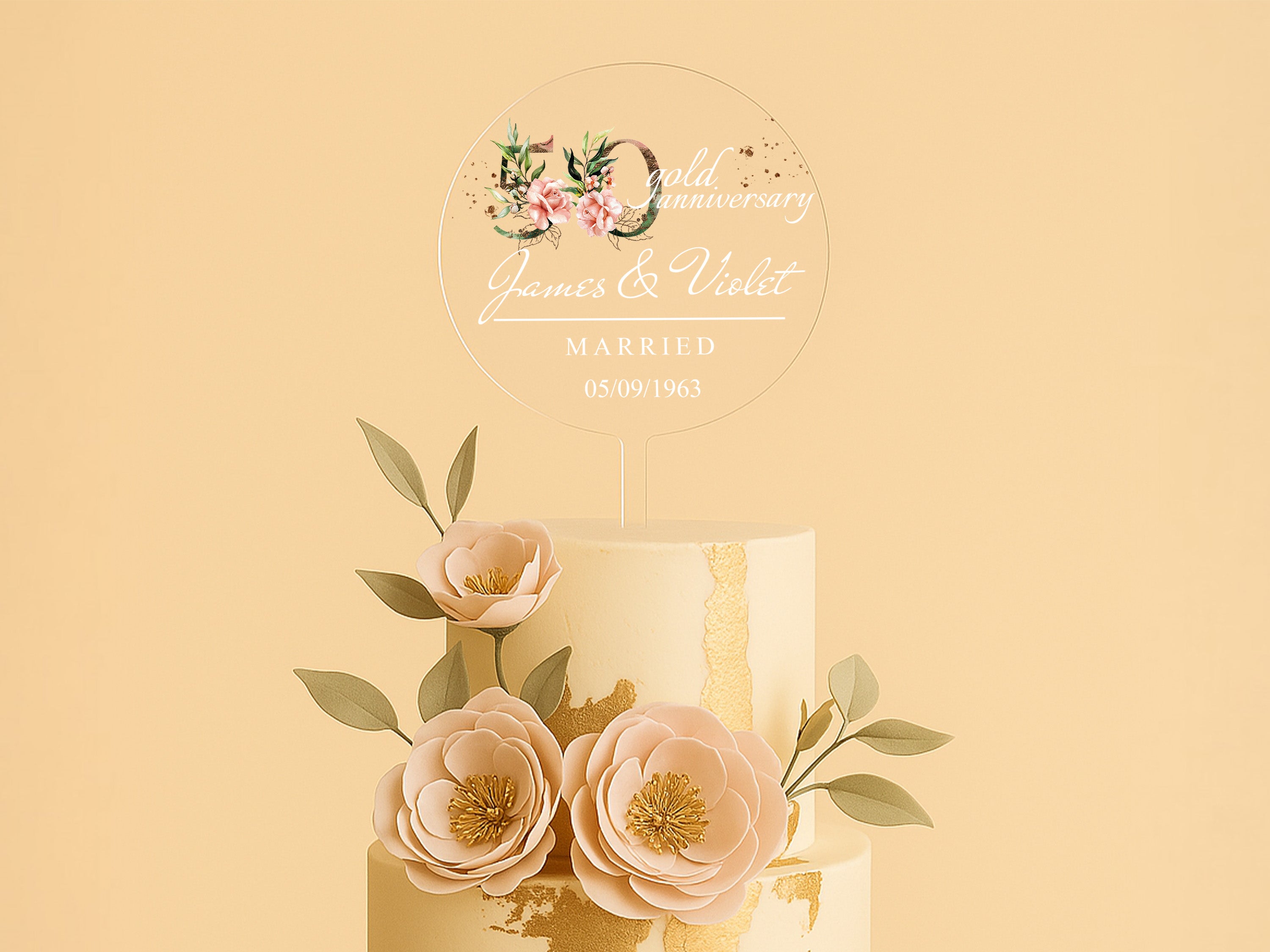 a three tiered wedding cake with flowers on top