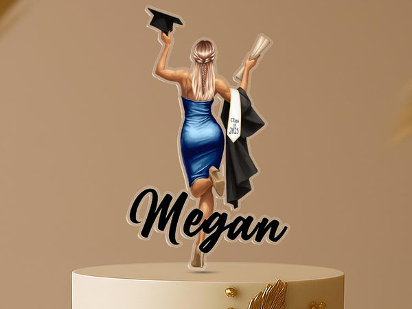 Personalised acrylic graduation cake topper featuring a female graduate in cap and gown, holding diploma and hat, custom name in script, Class of 2025.