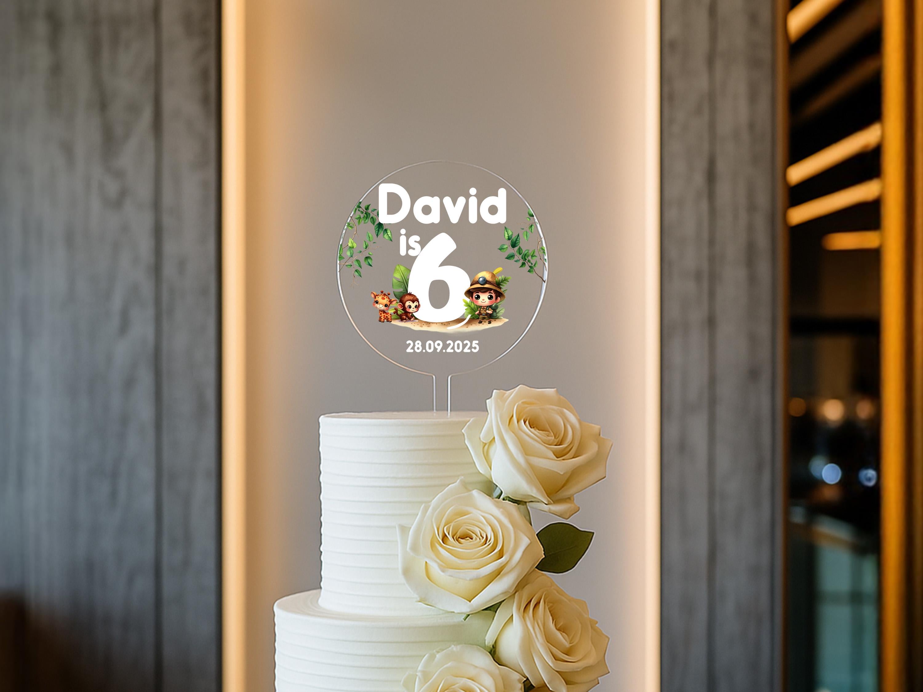 a white cake with flowers on top of it