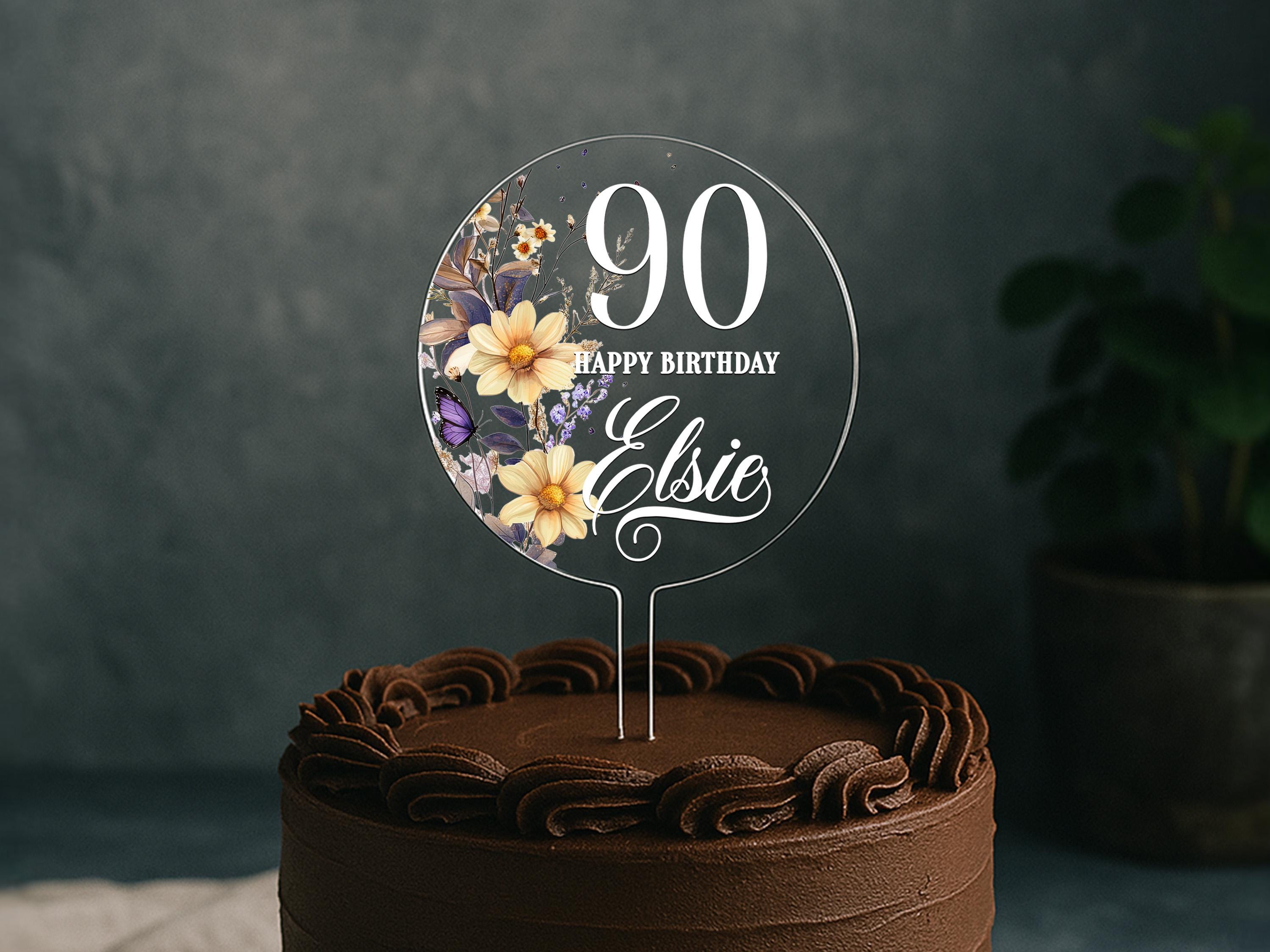 a chocolate cake with flowers on top of it