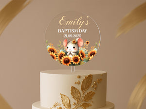 a cake with a mouse on top of it