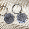 Silver star map keychain with engraved night sky