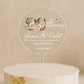 a wedding cake with a cake topper that says gold anniversary james and violet married