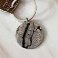 Personalised stainless steel keychain with custom city map and engraved message