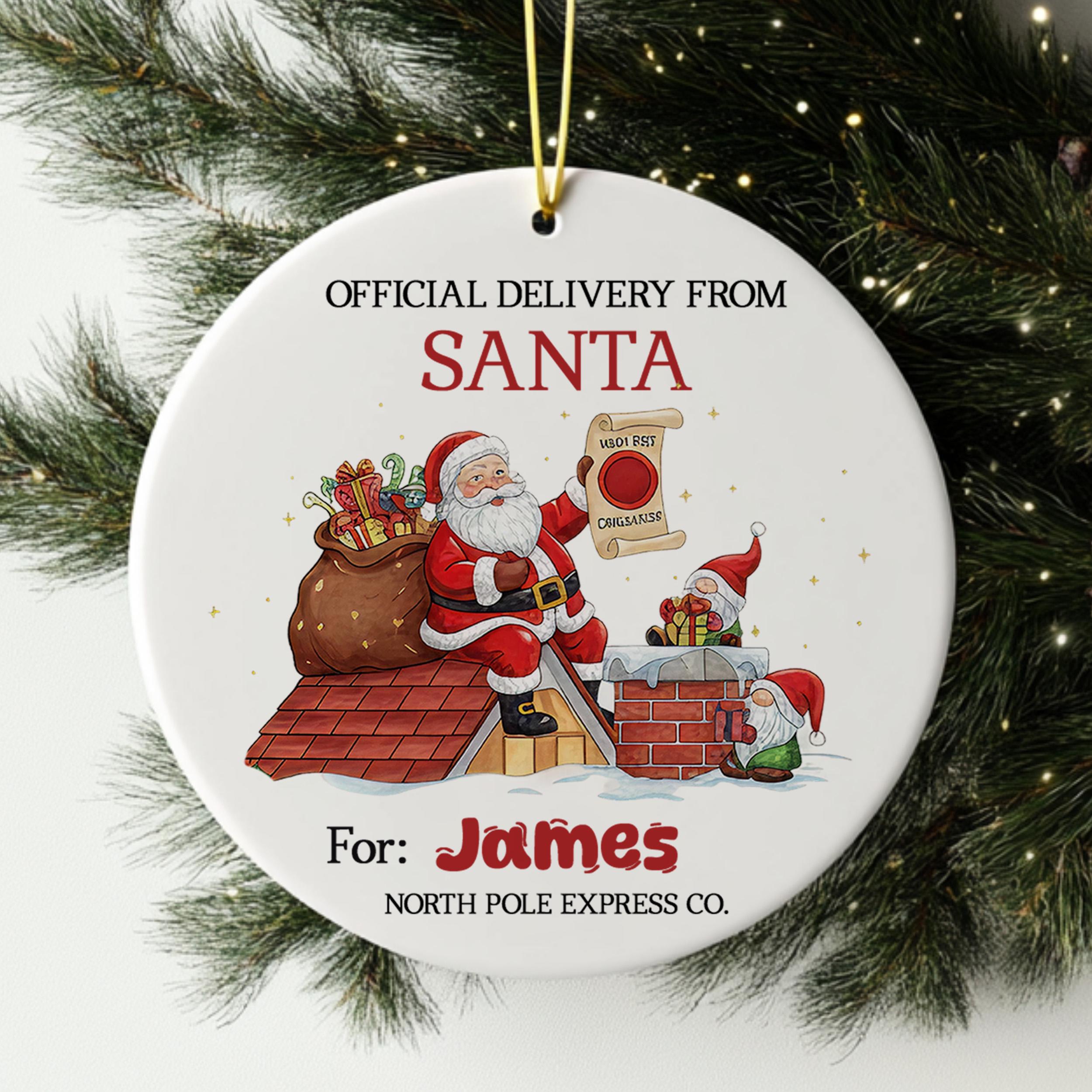Santa Claus holding a sign that says "I'm sorry, I can't deliver organic produce" and a gnome holding a sign that says "I'm sorry, I can't deliver organic produce". The ornament is hanging from a string, and it is for the person named James.