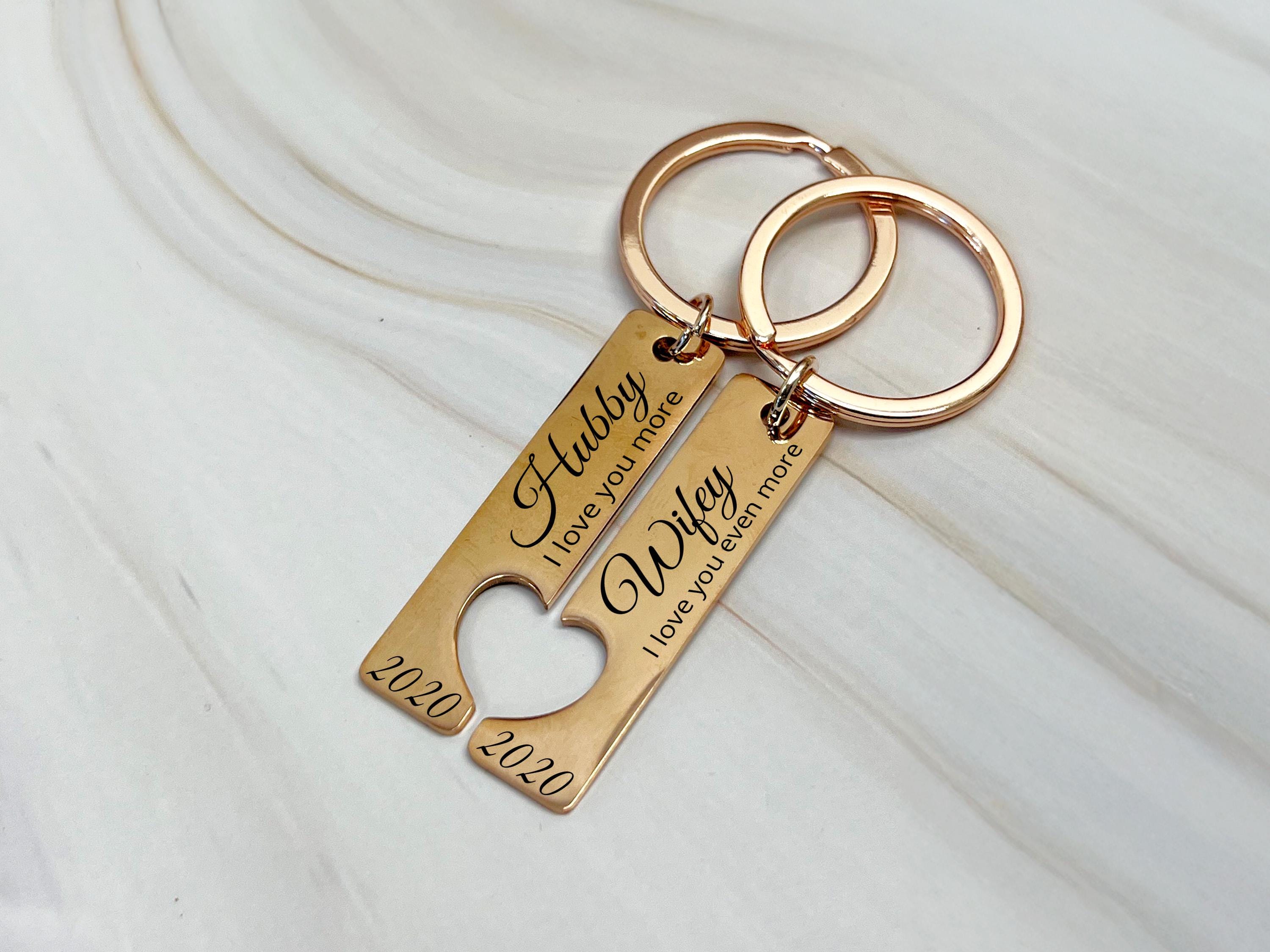 Custom engraved couples keychains, matching Hubby and Wifey keyrings in rose gold stainless steel, perfect for wedding or anniversary gift.