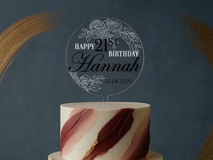 a white and red cake with a happy 21st birthday sign on top