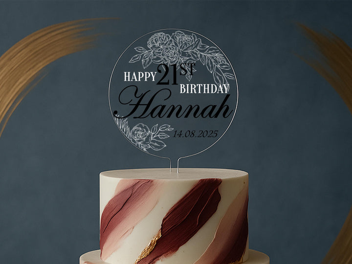a white and red cake with a happy 21st birthday sign on top