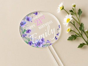a personalized lollipop with flowers on it