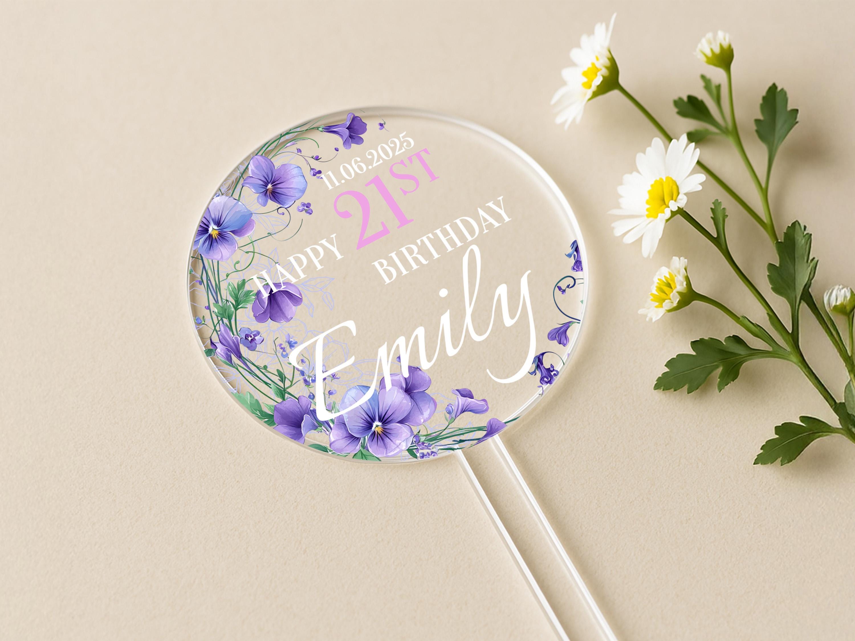 a personalized lollipop with flowers on it