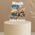 Custom monster truck birthday cake topper featuring number 6 with vehicle details, mechanical gears and personalised name Noah on celebration cake
