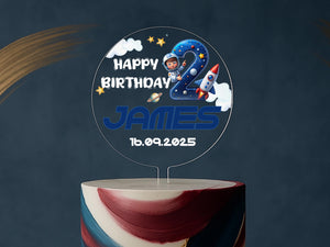 a birthday cake with a photo of an astronaut on it