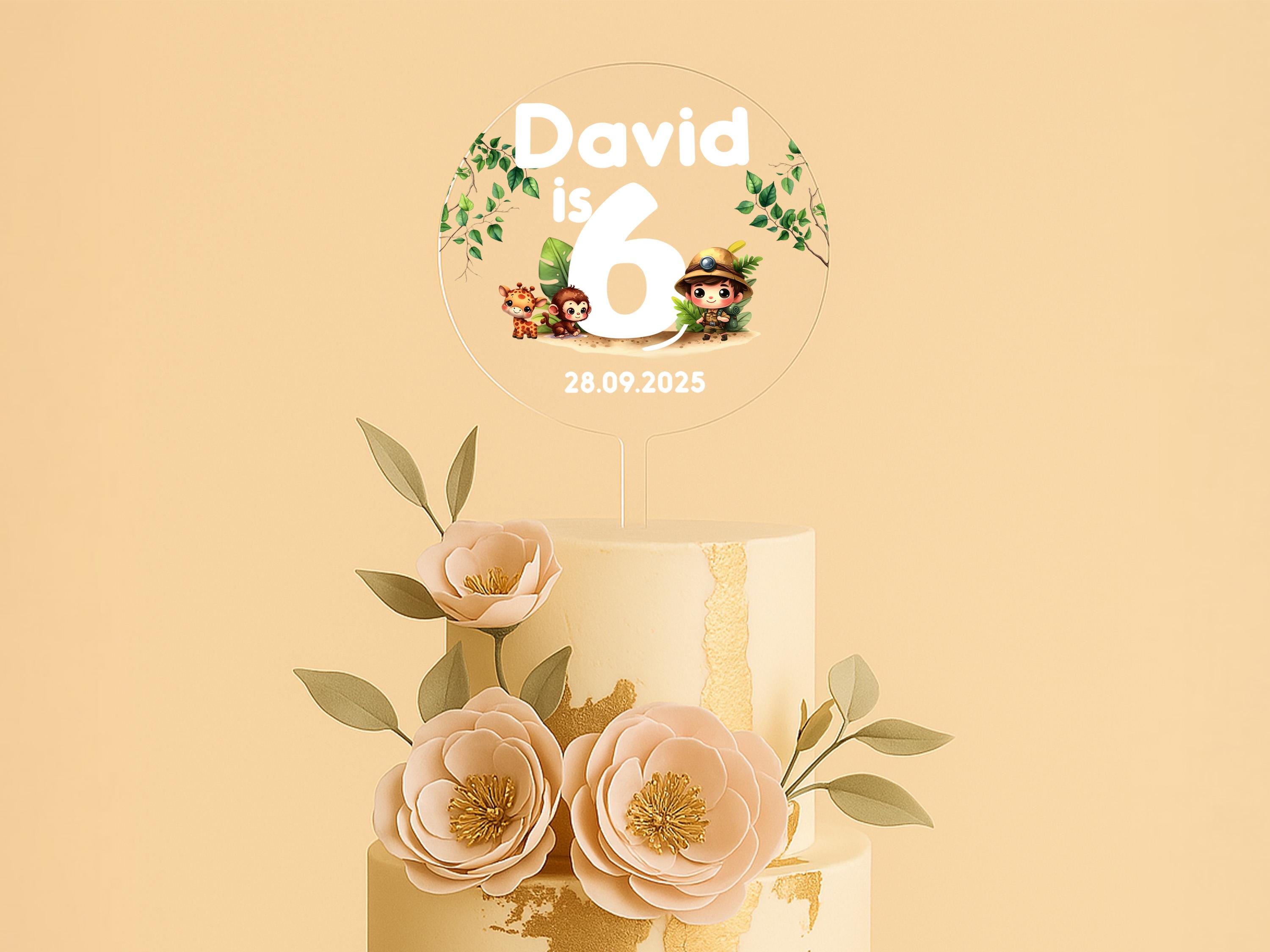 a wedding cake with flowers on top of it
