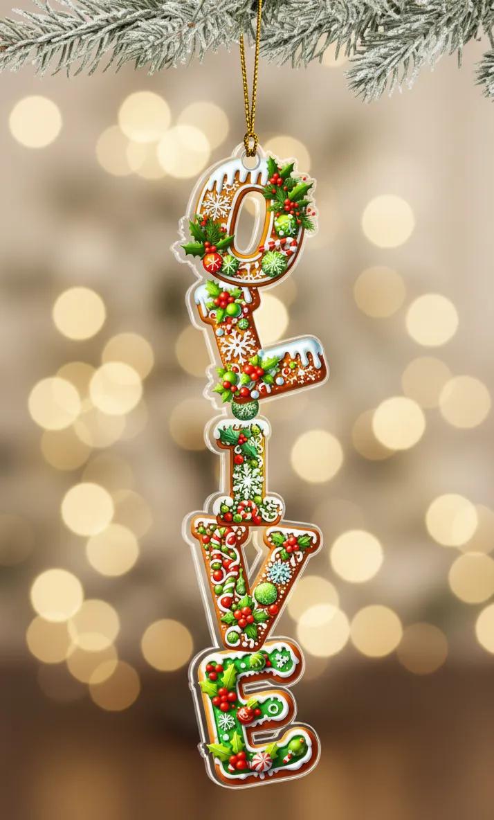 A decorative ornament made of colorful letters spelling out &quot;OLIVE&quot; hanging from a branch with pine needles.