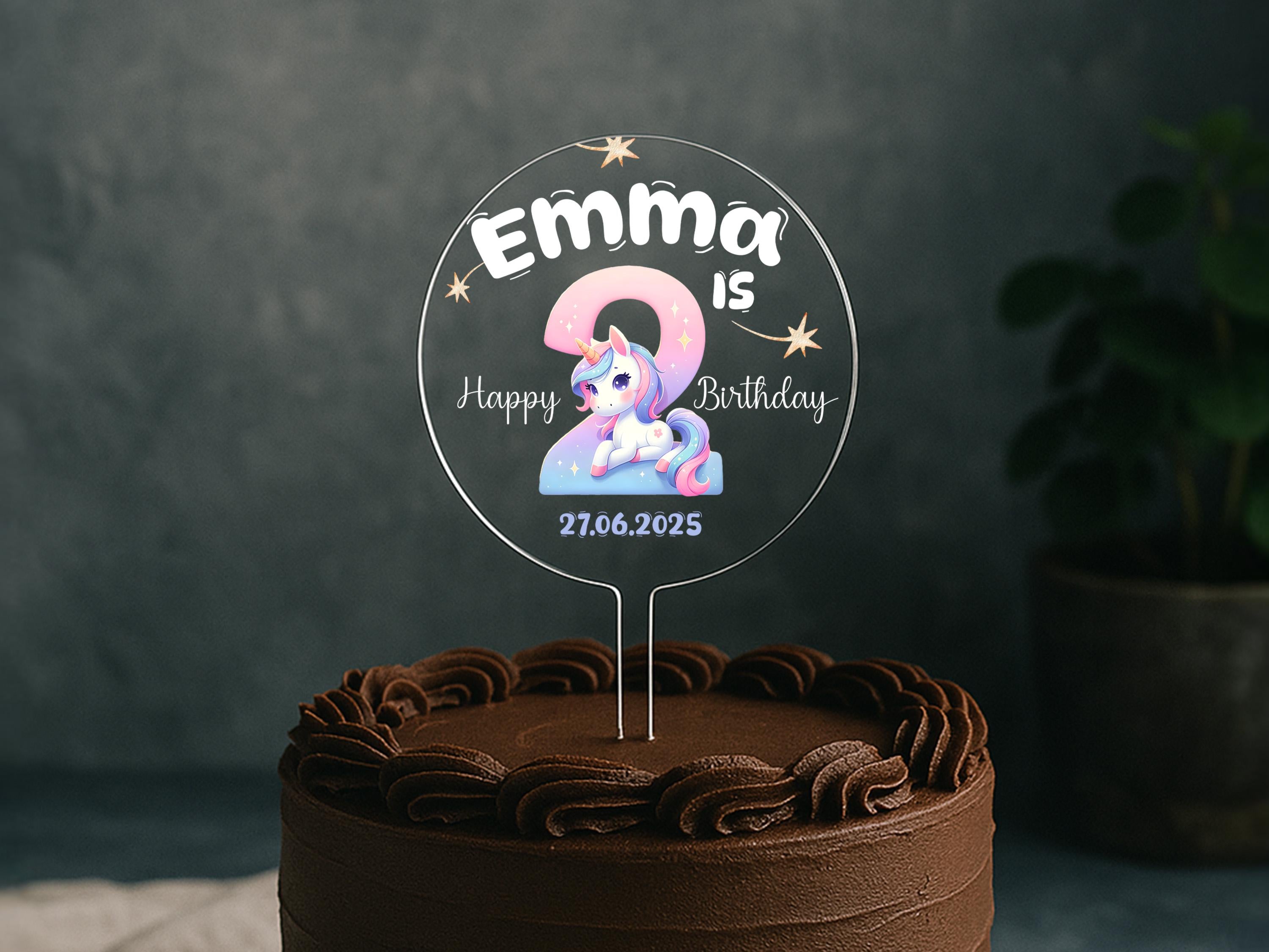 Personalised unicorn birthday cake topper with name, age, and pastel colours