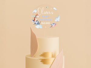 a three tiered cake with a name on top