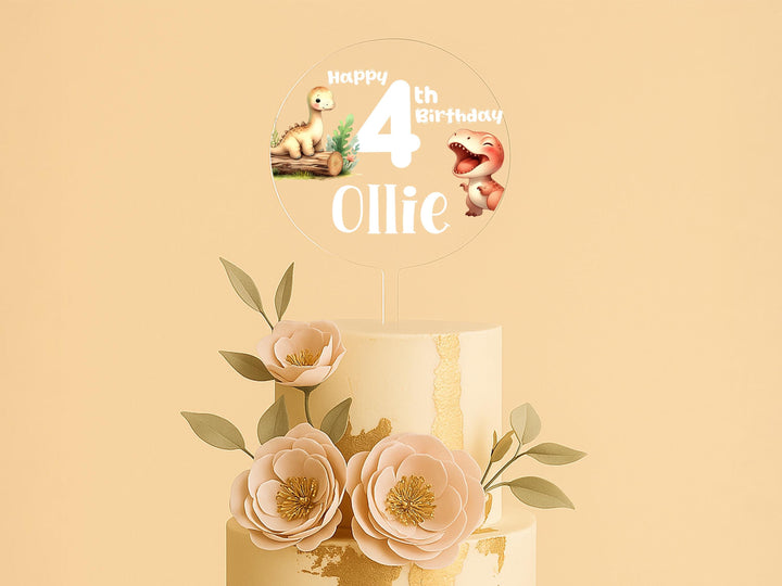 a three tiered cake with flowers on top of it