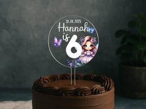 a chocolate cake with a picture of a girl on it
