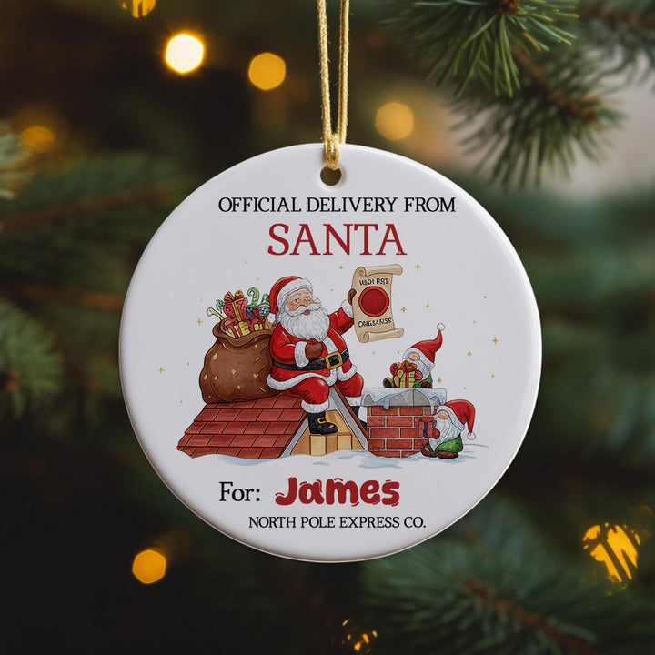 a Christmas ornament with a Santa Claus figure holding a bag of presents, standing on a rooftop with a chimney.