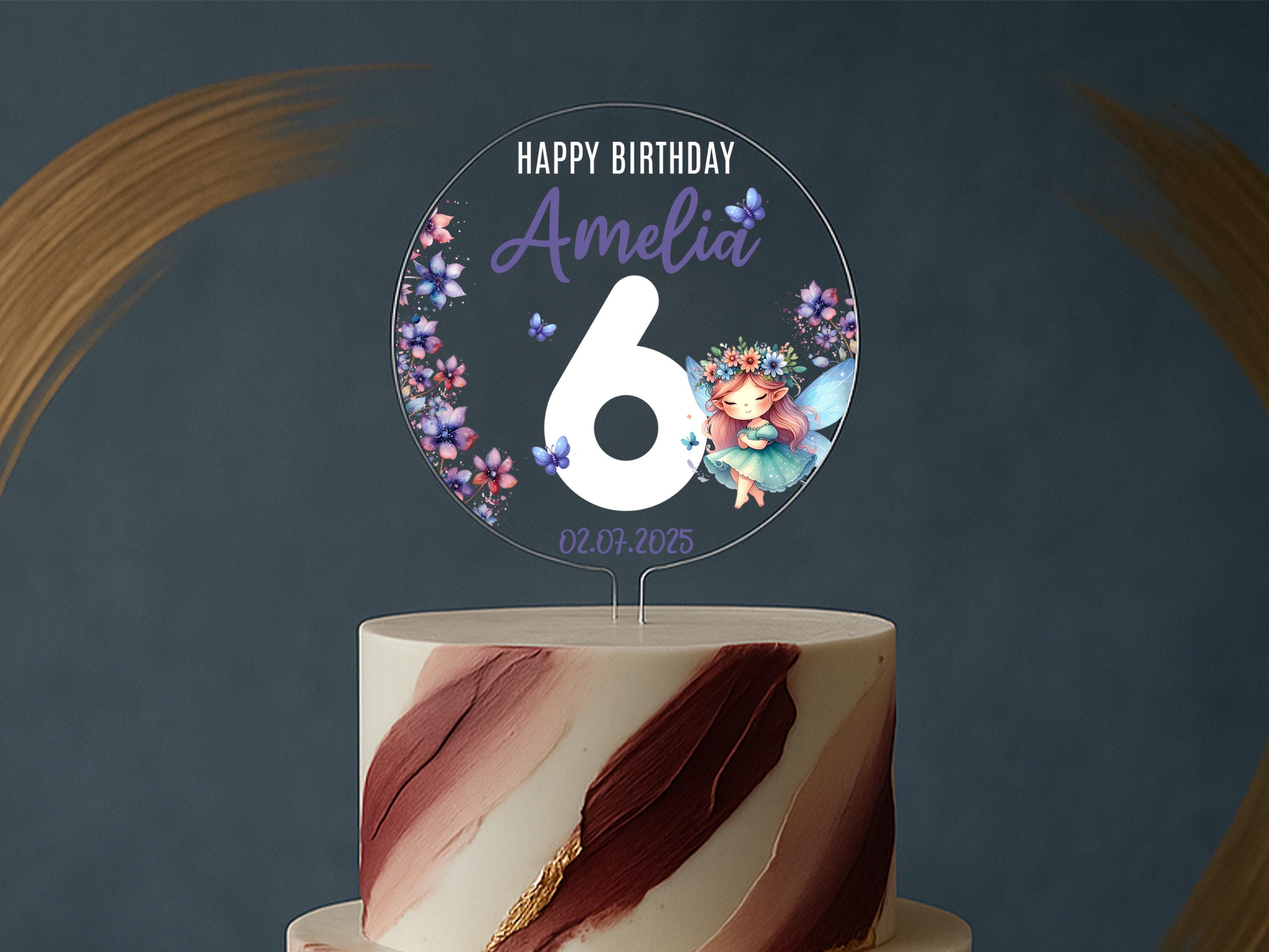 a birthday cake with the number six on it