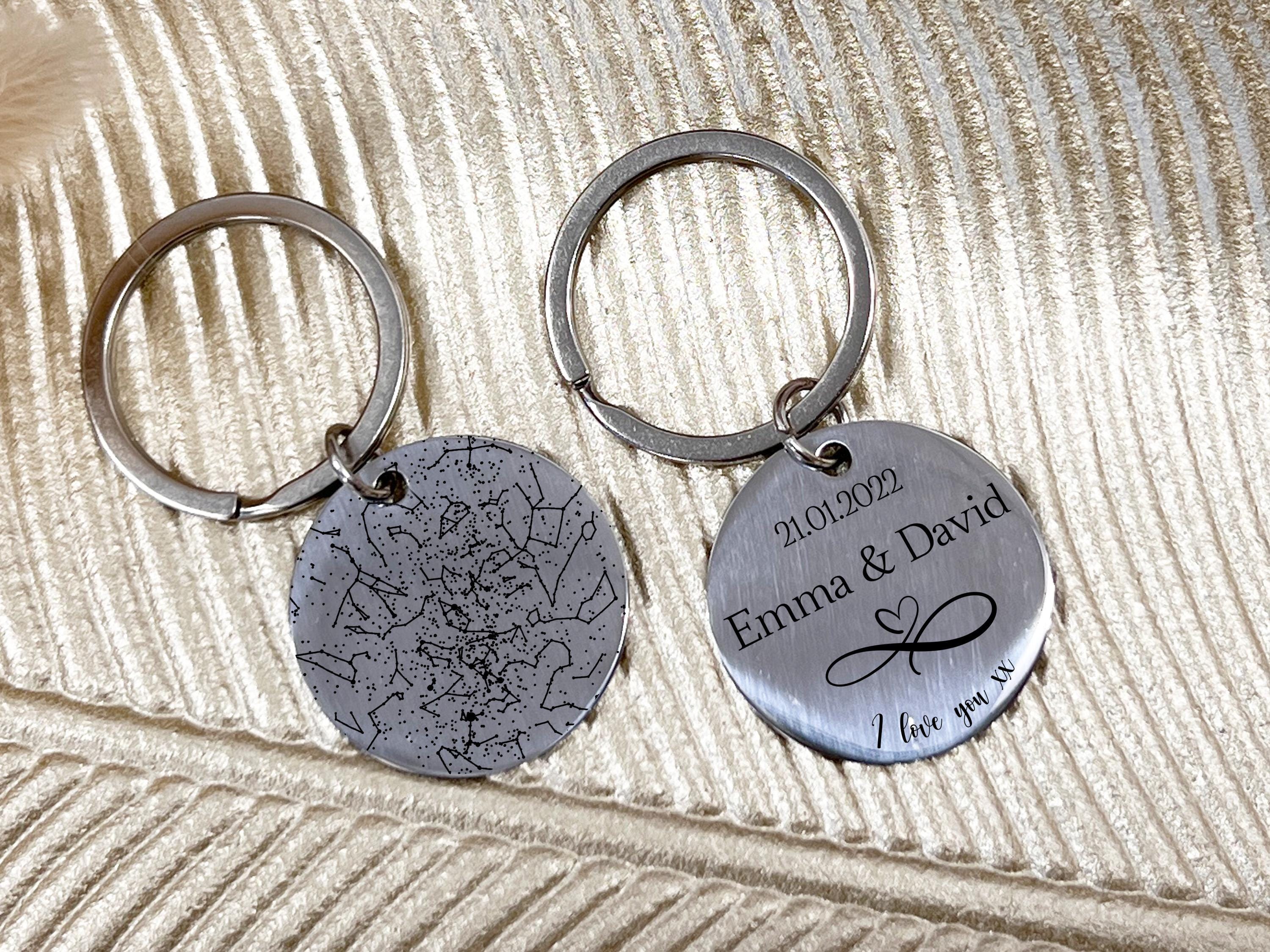 Custom stainless steel keychain with engraved star map constellation and couple's names
