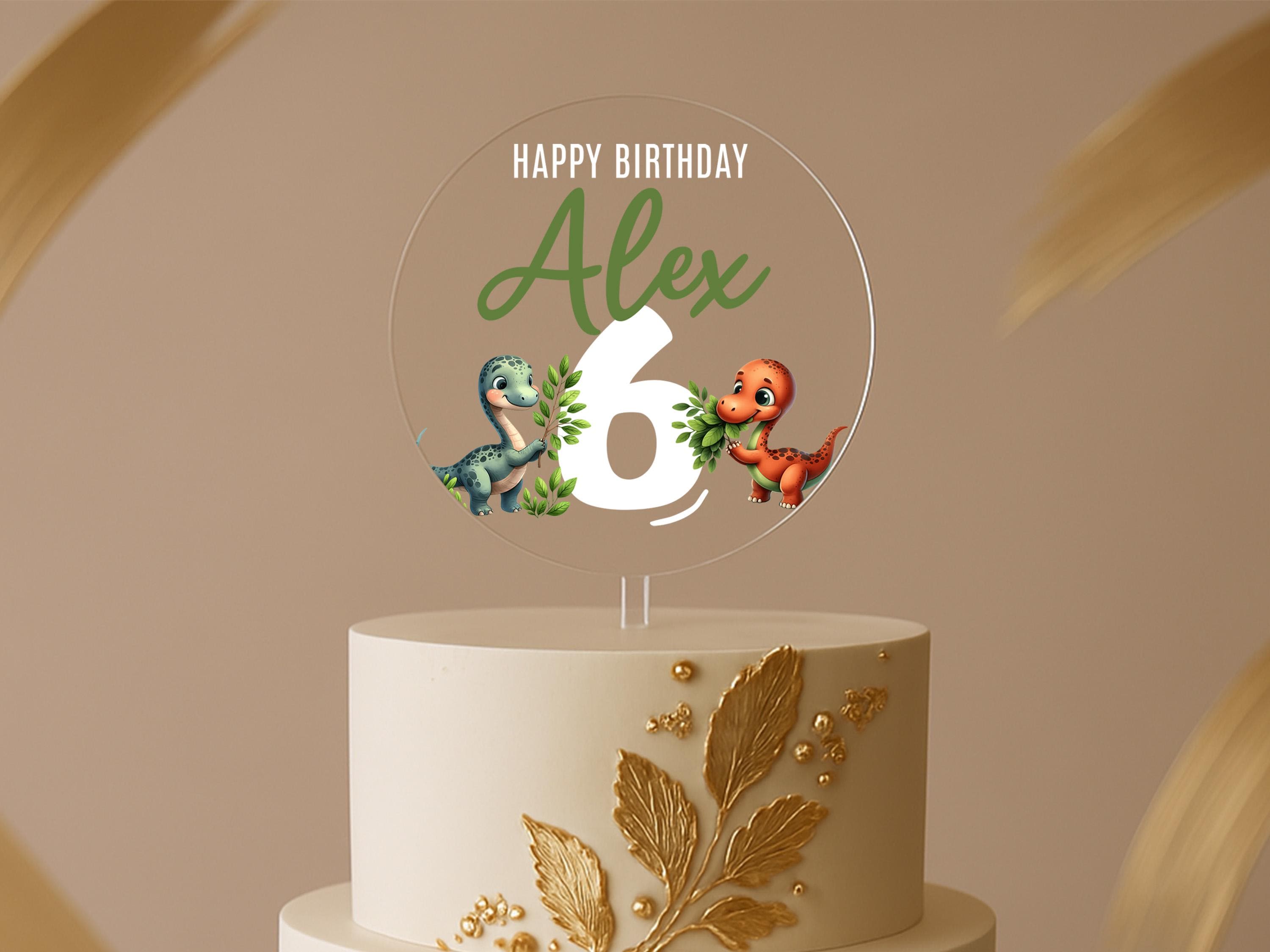 a birthday cake with the number six on it