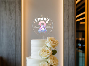 a white cake with flowers on top of it