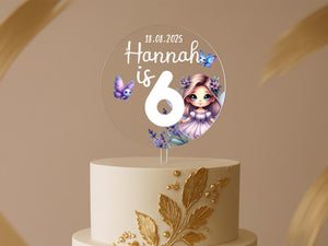 a birthday cake with a picture of a girl on top