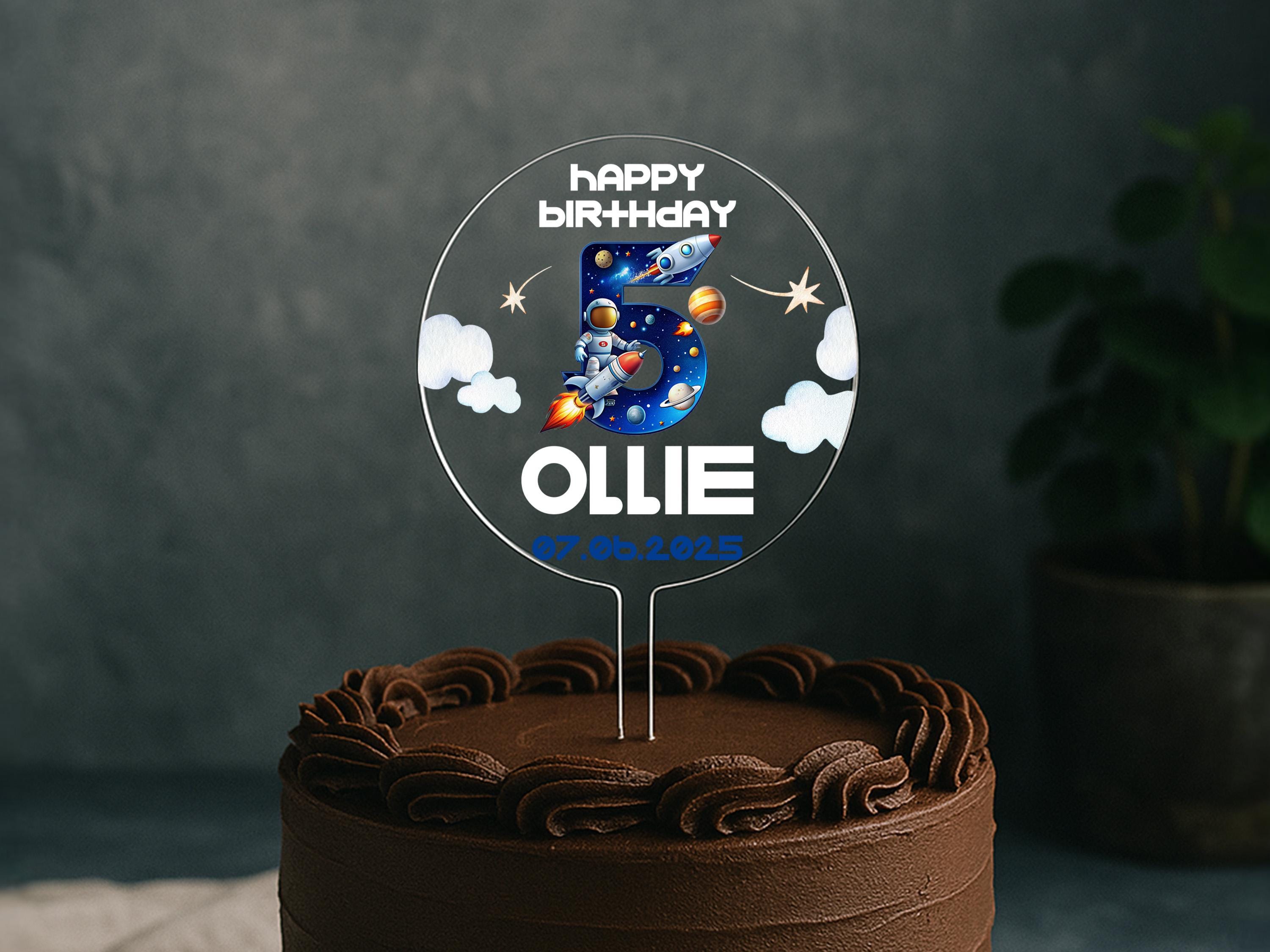 a birthday cake with the number five on it