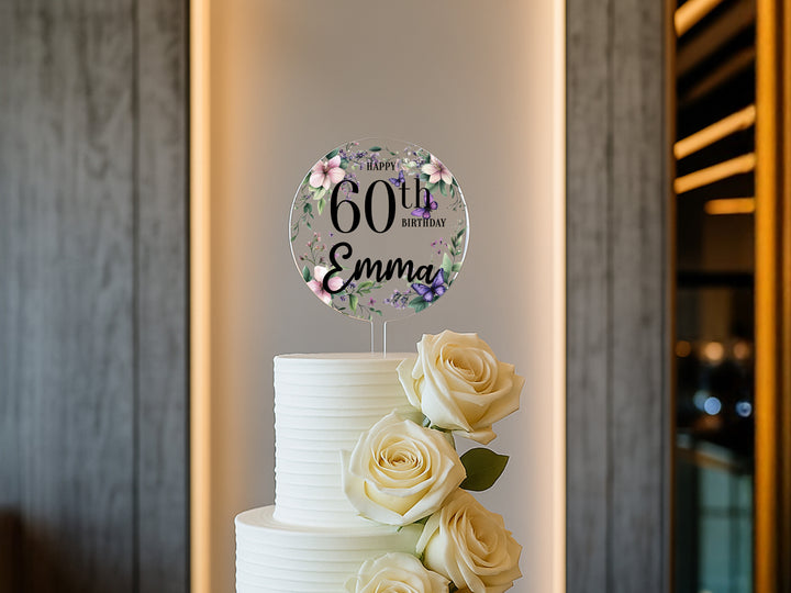 a white wedding cake with white roses on top