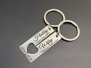 Personalised wedding gift keyrings in rose gold, Hubby and Wifey engraved, heart puzzle design for couples celebrating their love.