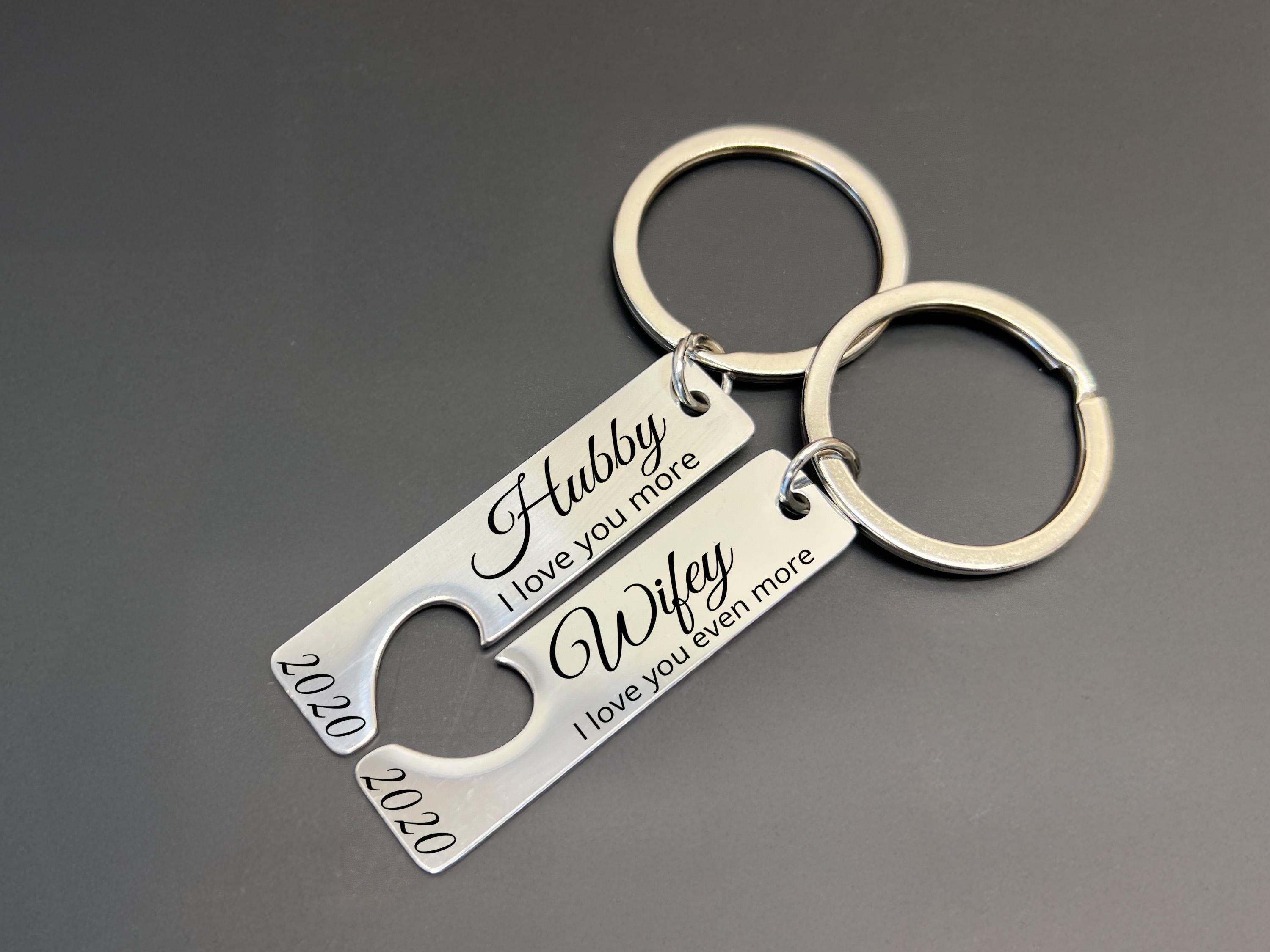 Personalised wedding gift keyrings in rose gold, Hubby and Wifey engraved, heart puzzle design for couples celebrating their love.