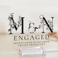 This clear acrylic plaque is available in both A5 and A4 sizes and is the perfect gift for a newly engaged couple. The plaque features black and white letters with the monogram of the first letter for the couple's names.