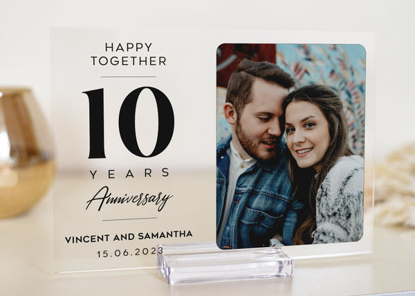 This personalized anniversary plaque is the perfect gift for any couple celebrating their 1 year or 10 year anniversary. Made of high-quality acrylic, this plaque is custom engraved with the names of the happy couple and the date of their anniversary